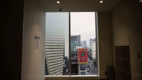 Tokyo Ginza Skyline Seen Through Window Stock Footage 104417182