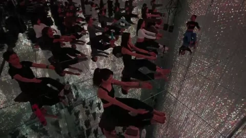 Tokyo hosts yoga class inside digital art space teamLab Borderless, JAPAN, JP -  Stock Footage 329564618