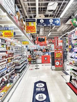 Tokyo, Japan on 19 Oct 2025. Shoppers Navigate Electronics Aisles in Japane.. Stock Photos
