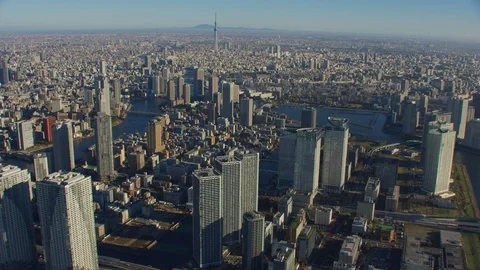Tokyo, Japan circa-2018.  Flying over city towards Tokyo Skytree.  Shot from Stock Footage 101296471