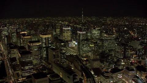 Tokyo, Japan circa-2018.  Flying over Tokyo to Skytree at night.  Shot from Stock Footage 101301429