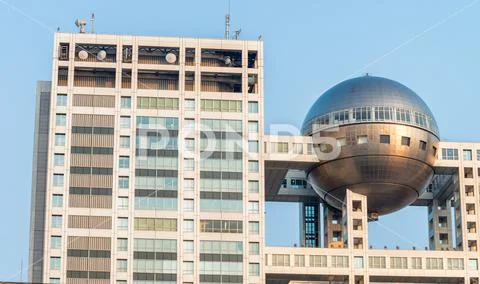 TOKYO, JAPAN - MAY 2016 : The futuristic Fuji TV Building in Odaiba. its futu Stock Photos