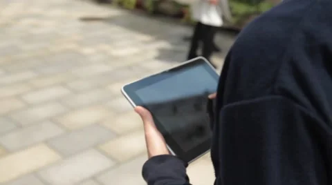 Tokyo man using tablet on street 1 Video stock 40516941