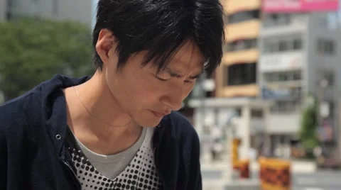 Tokyo man using tablet on street 2 Video stock 40516945