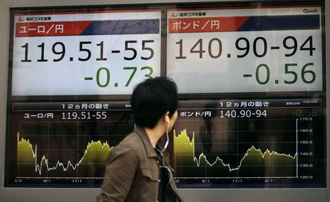 Tokyo markets react to first round of French presidential election, Japan - 24 A Stockfoto's
