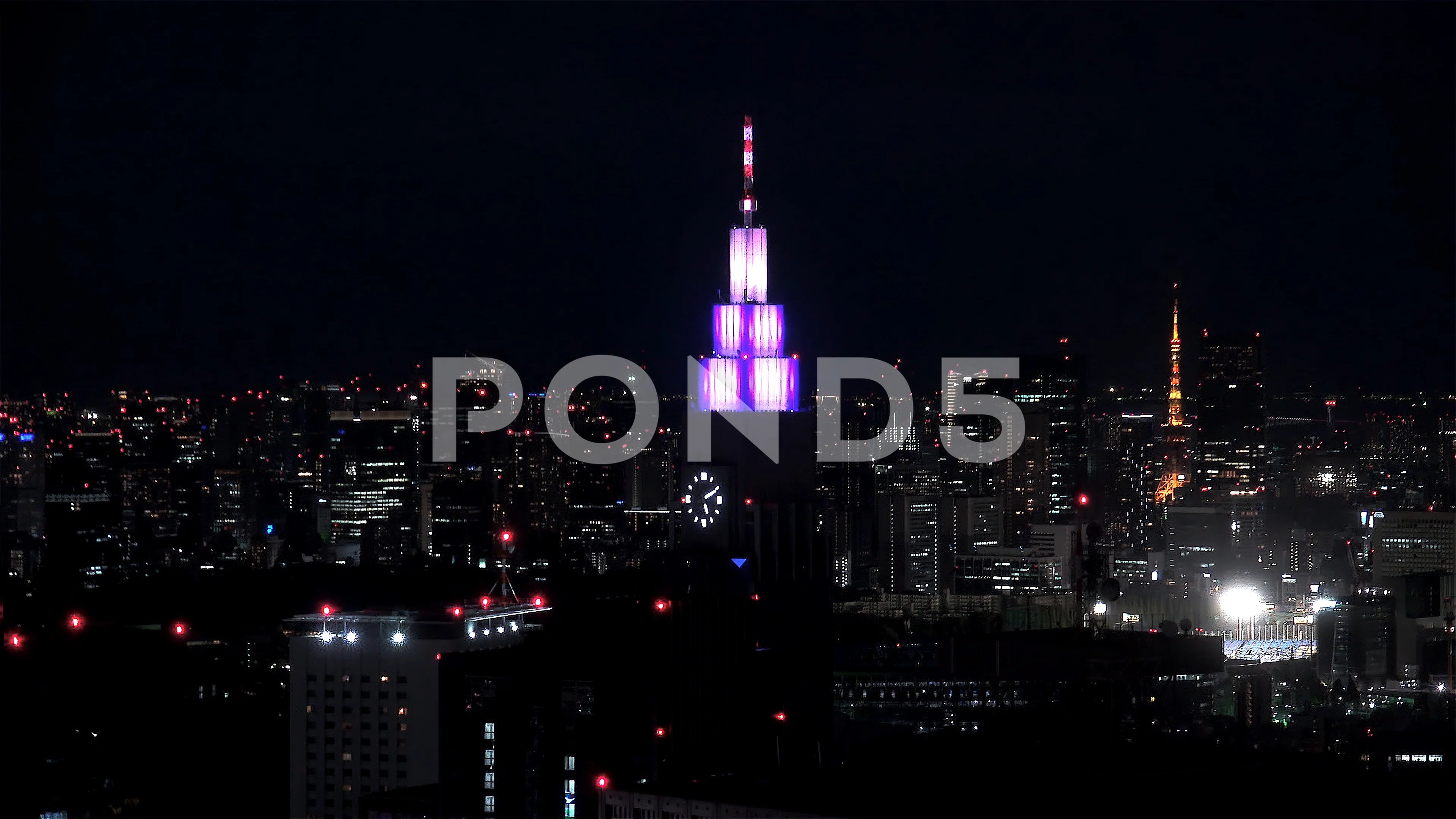 Tokyo Night Skyline With The Clock Of Do Stock Video Pond5