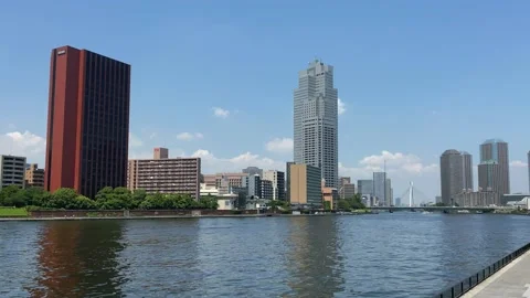Tokyo sky line view from the Sumida river side, in the background the famous Stock Footage 157568873