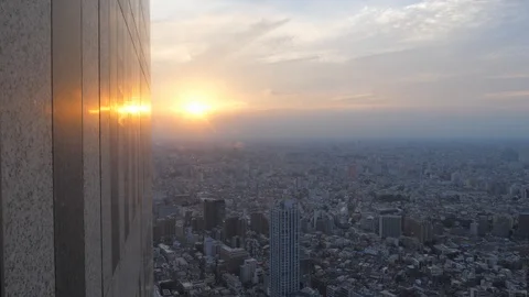 Tokyo skyline view from skyscraper at sunset, Japan in 4K Stock Footage 107334774