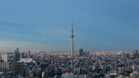 Tokyo Skytree and Sumida River Skyline 4K Aerial Drone Pull Back View Stock Footage 337431498