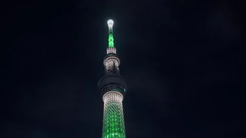 Tokyo Skytree Lit Up at Night with Moving Observatory Lights Stock Footage 312036093