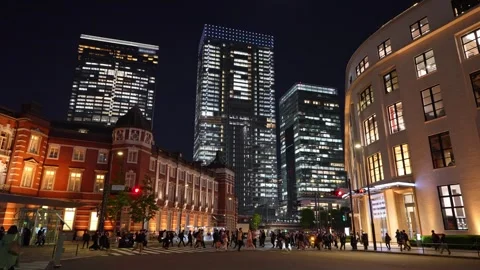 Tokyo Station Night View with Commuters in Marunouchi, Tokyo 動画素材 344832788