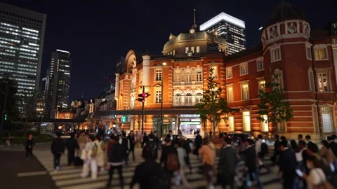 Tokyo Station Night View with Commuters in Marunouchi, Tokyo Stock Footage 344832799