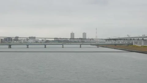 Tokyo Suburb View from moving train through train window with view of Tokyo.. Stock Footage 317220171