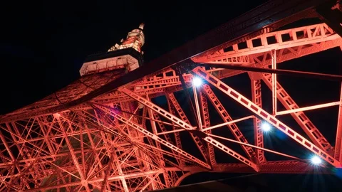 Tokyo Tower architecture at night, extremely low angle view. 4K time-lapse Stock Footage 128133453