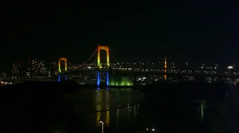 Tokyo Tower over Rainbow Bridge - Odaiba Bay - HD Stock Footage 16941795