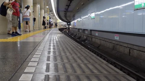 Tokyo train arriving Stock Footage 121574102