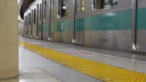 Tokyo train arriving Stock Footage 121574456