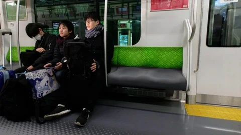 TOKYO TRAIN COMMUTERS Stock Footage 84291767