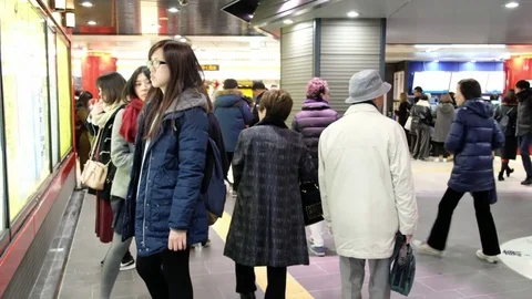 TOKYO TRAIN COMMUTERS Stock Footage 84293291