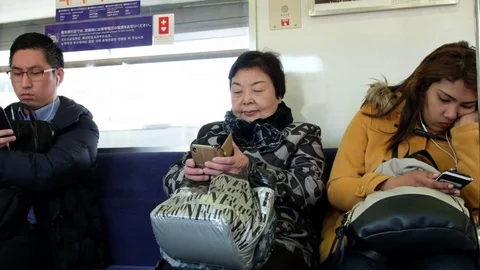 TOKYO TRAIN COMMUTERS Stock Footage 84474160