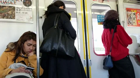 TOKYO TRAIN COMMUTERS Stock Footage 84474581