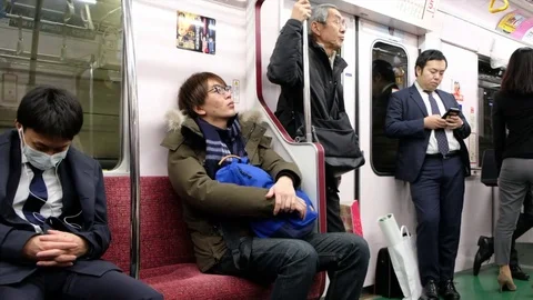 TOKYO TRAIN COMMUTERS Stock Footage 84494887