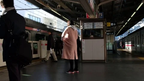 TOKYO TRAIN COMMUTERS Stock Footage 84504352