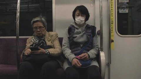 TOKYO TRAIN COMMUTERS Stock Footage 106473133