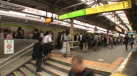 Tokyo Yamanote Train Line platform at rush-hour Stock Footage 8601630