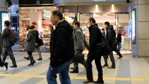 Tokyo's Rush Hour Commuters Stock-Footage 114996492