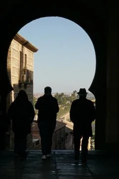 Toledo’s ancient View Framed by a moorish archway Stock Photos