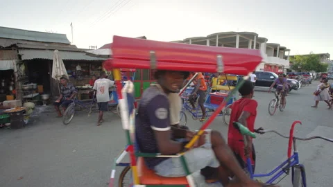 Toliara, Madagascar - May 01, 2019: Typical evening scene at busy crossroad.. Stock Footage 252534603