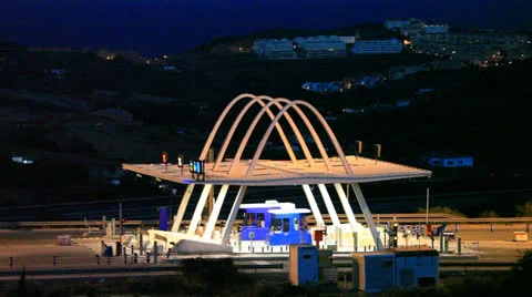 Toll gate illuminated at night Видео 25365280