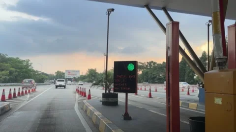 Toll Gate Opens with Cloudy Sky Background Stock Footage 244857459