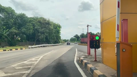 Toll road ticket booth with automatic barrier Stock Footage 293676018