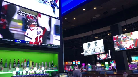 Tom Brady Throws Interception in Last Game, Tv's Sports Bar Stock Footage 230482606