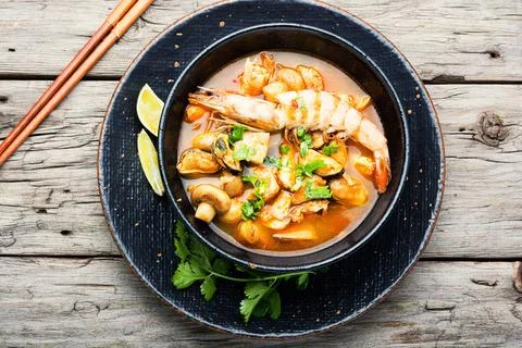 Tom yum soup with seafood and coconut milk Stock Photos