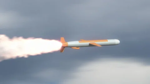 Tomahawk cruise missile flying in the clouds. Stock Footage 154596630
