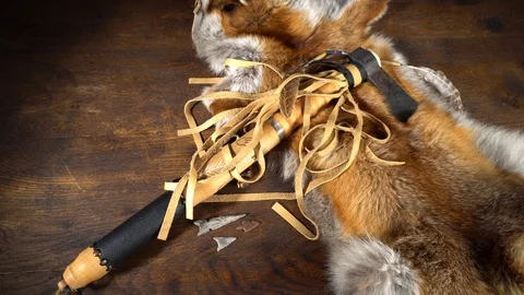 Tomahawk with Fox Coat on wooden Table Stock Footage 126103814