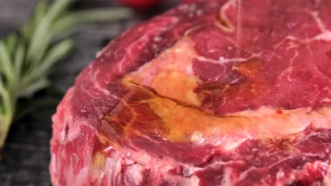Tomahawk ribeye steak, Irish beef, drizzled with oil Stock Footage 194485245