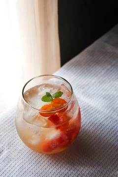 Tomato ade is a common drink in cafe consist of tomato with soda and garnis.. Stock Photos
