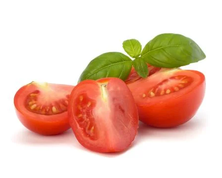 Tomato and basil leaf Stock Photos