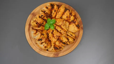 Tomato and crispy bread lies on the kitchen table Stock-Footage 252408266