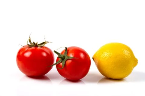 Tomato and lemon Stock Photos