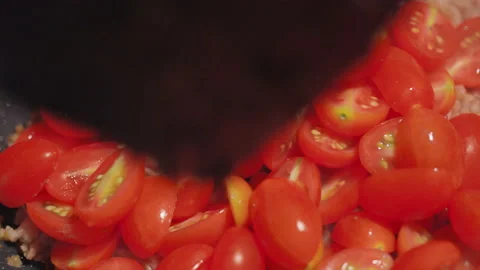 Tomato and minced pork get stir-frying on a pan with chilli paste. Macro shot. Stock Footage 146901079