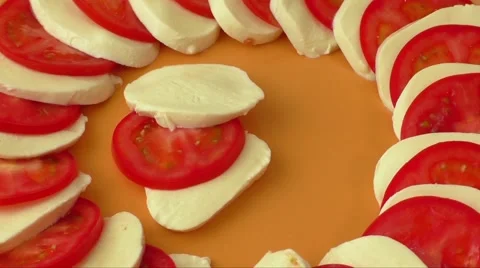 Tomato and mozzarella on a plate Stock Footage 62834829