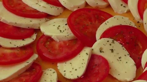 Tomato and mozzarella on a plate Stock Footage 62834839