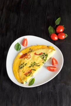 Tomato - basil omelette                      Stock Photos
