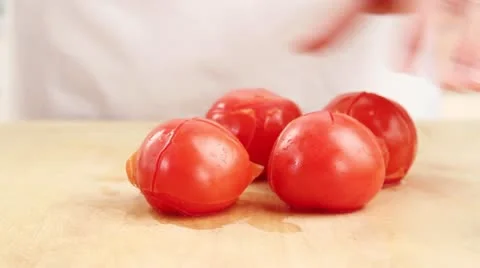 A tomato being peeled Stock Footage 24652854