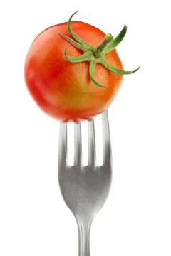 Tomato camone on fork Stock Photos